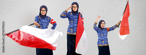 female civil servants wearing Indonesian Korpri uniform proudly holding red and white flags, symbolizing patriotism and unity. Perfect for Independence Day, Youth Pledge or ASN campaign.