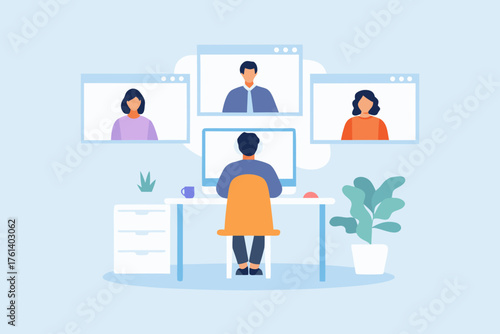 Man working from home in a video conference with colleagues on his computer screen