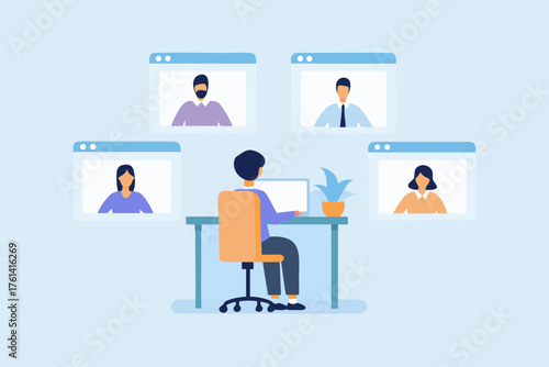 Person at desk participating in a video conference call with multiple participants