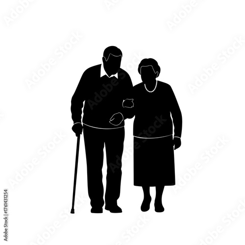 Elderly couple walking together while holding hands in silhouette  