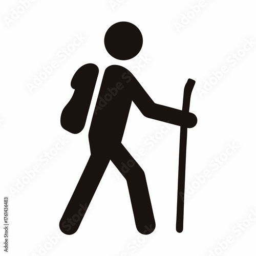 Black silhouette of a hiker with backpack and walking stick trekking
