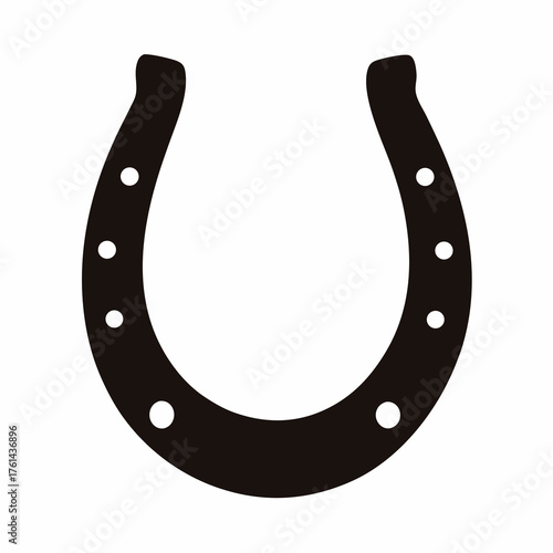 Black horseshoe with holes on white background, symbol of luck