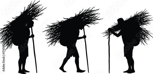 Silhouette of rural men carrying firewood bundles on back walking with sticks, traditional lifestyle, village labor, countryside hard work