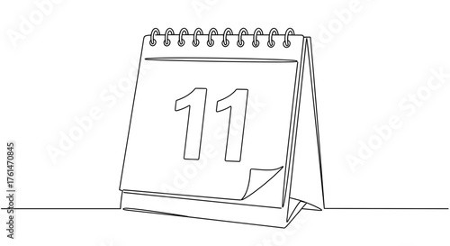 Desk calendar displaying the number eleven on a minimal background  