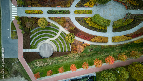 lush garden scene, structured garden with trees, formal garden with pathways and lush plants