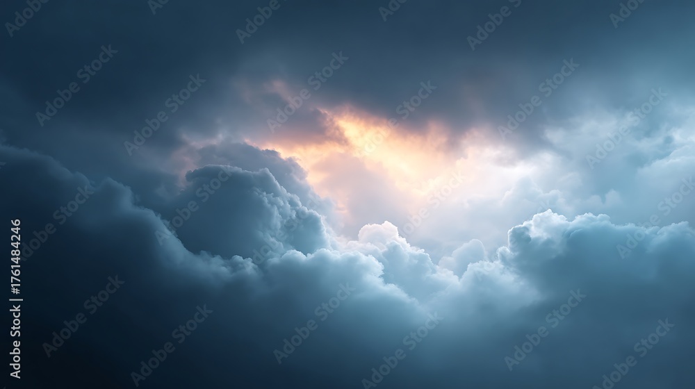 Obraz premium Dramatic storm clouds glowing with sunlight breaking through gaps