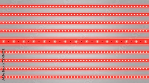 Close-up of a red light therapy device, showcasing the array of LEDs designed for skin rejuvenation and therapeutic applications on a textured surface.