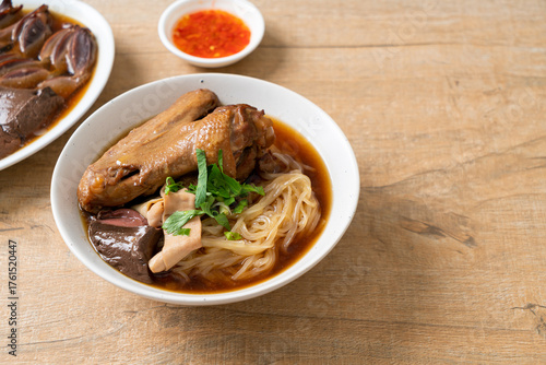 Photography Braised duck noodles with brown soup