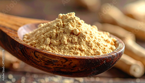ashwagandha root powder on a wooden spoon, softly lit with warm tones. The natural texture and earthy color convey a sense of organic wellness and adaptogenic nutrition