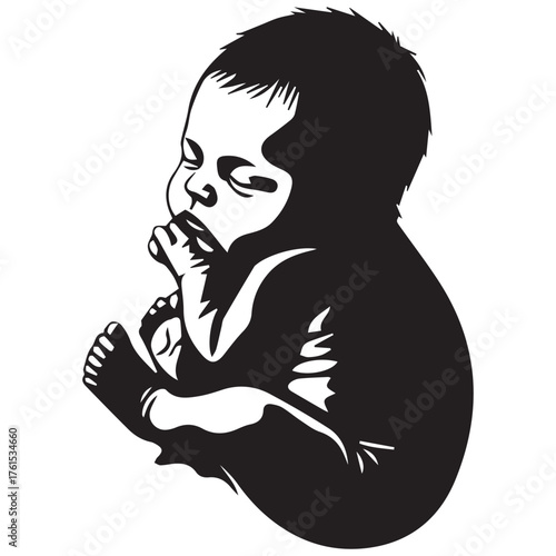 Artistic silhouette of a newborn baby sleeping peacefully in a fetal position
