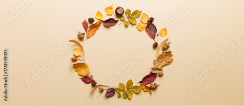 Autumn composition made of dried leaves, cones and acorns on table. Flat lay, top view