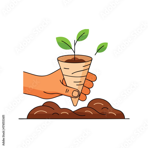 A hand plants a seedling in the soil.