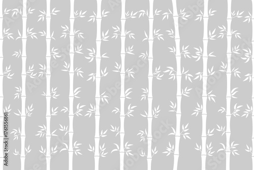 Seamless pattern of white bamboo stalks and leaves arranged vertically on a soft gray background.