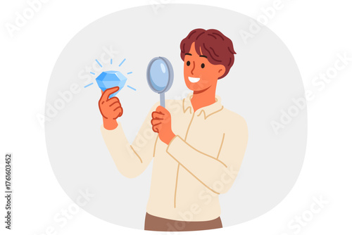 Business man with diamond and magnifying glass, for concept of opportunity and luck in career. Diamond in hand of positive jeweler enjoying work and studying gemstone that promises great profit