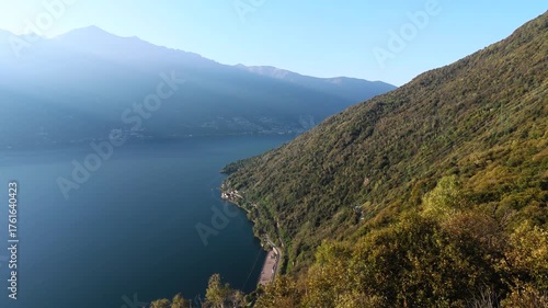 Wallpaper Mural Fly close over treetops, view over Lake Maggiore at late afternoon Torontodigital.ca