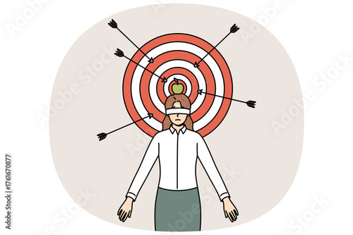 Business woman takes risks to achieve career goals, stands blindfolded near dartboard. Concept of business risk and participation in dangerous projects due to lack of planning or vision about future