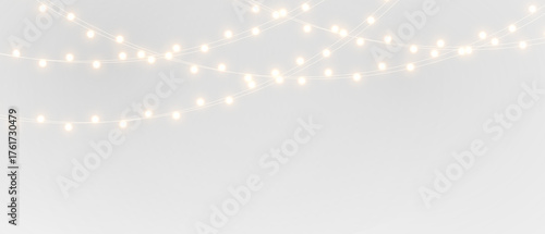 Elegant string lights overlay on black and white backgrounds, glowing warm garland creating festive atmosphere for Christmas decoration and celebration projects.	