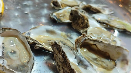 fresh oyster on silver plate