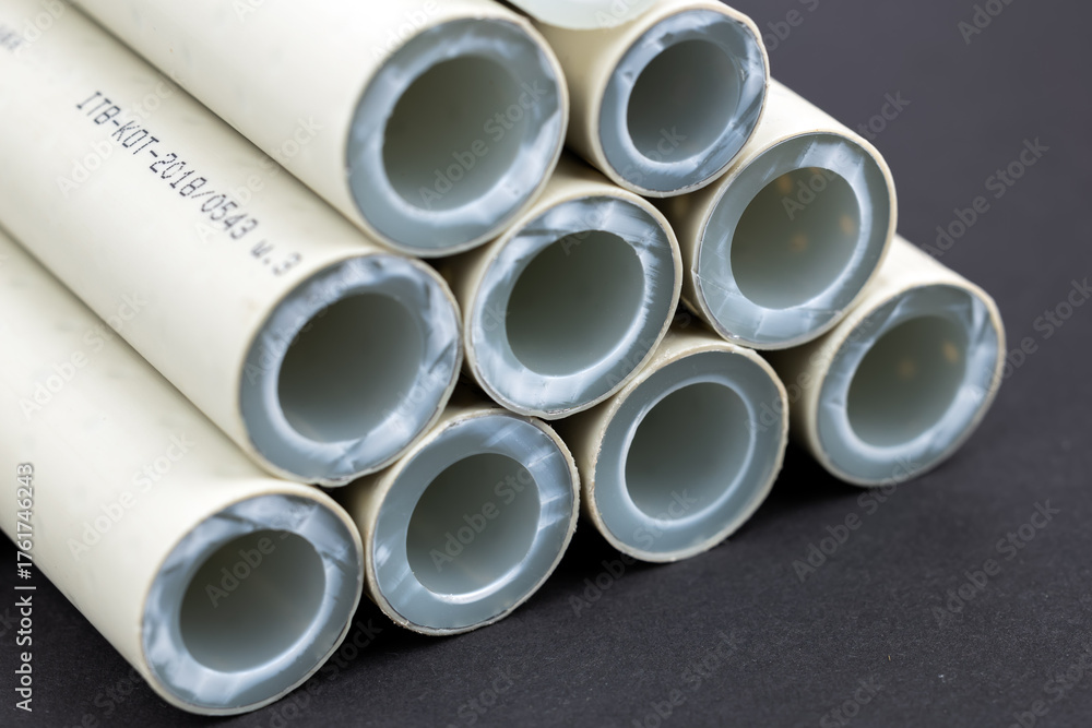 Fototapeta premium Various polypropylene pipes for soldering on dark