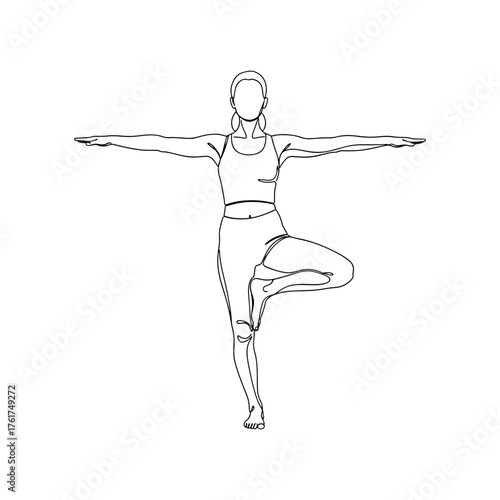 Graceful woman in serene tree pose embodies balance and mindfulness, perfect for wellness and fitness inspiration