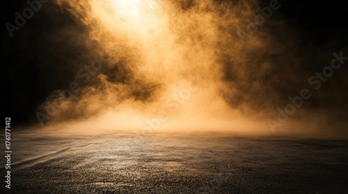 Smoky, golden spotlight on dark ground