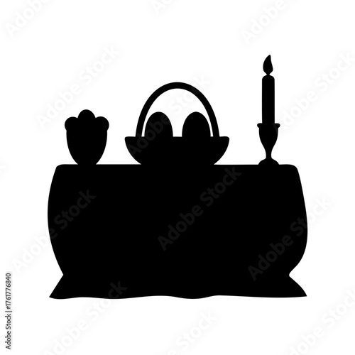A silhouetted Easter celebration table scape with basket of eggs