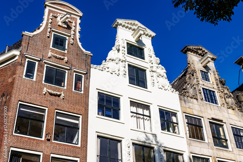 Photography Three ornate gables of canal houses in the historic center of Amsterdam, Noord-H