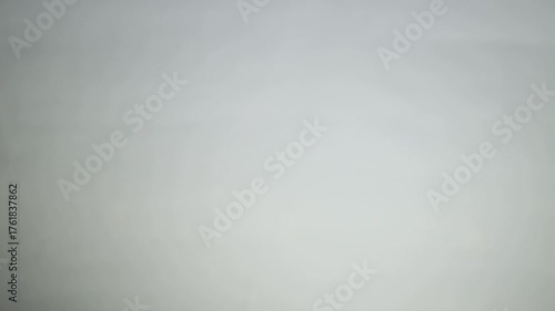 Blinking light, candlelight on a white background. Light turning on and off effect. Breathing light effect