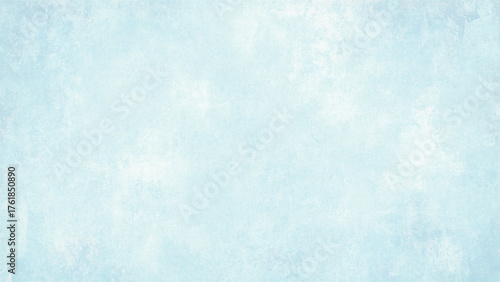 Textured blue watercolor background with a vintage  aged feel and a light  abstract pattern or wall texture