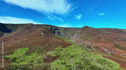 Irish mountain Landscapes drone rising revealing Coumshingaun Horseshoe popular hillwalking route in The Comeragh Mountains Waterford Ireland