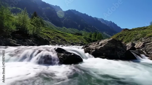 Time-Lapse River Flowing Through Mountain Valley