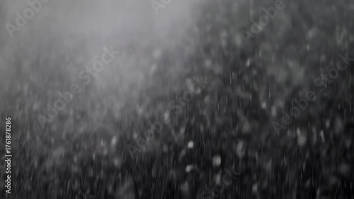 Blizzard of White: Falling Snow on Dark Abstract Background