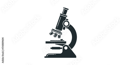 Dark silhouette of a scientific laboratory microscope for research.
