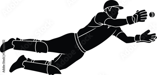 Silhouette of a cricket player diving to catch a ball