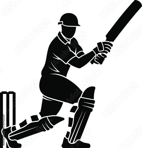 Silhouette of a cricketer batting in action