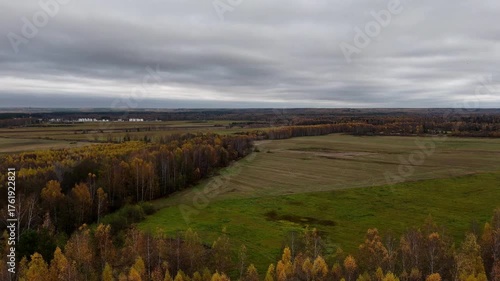Autumn landscape with trees and clouds