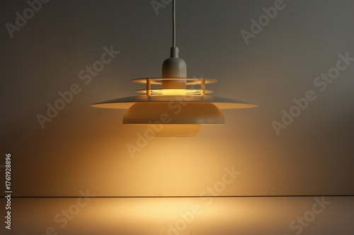 Mid century pendant lamp in multi layer design.