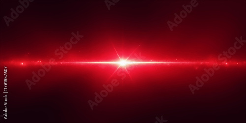Bright red lens flare effect illuminating a dark background with subtle bokeh