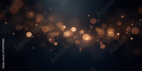 Abstract bokeh lights with golden and orange glows on a dark moody background