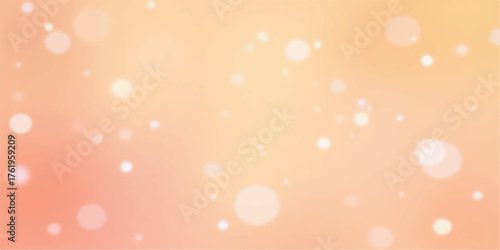 Soft focus abstract background with glowing bokeh lights in warm peach and orange tones