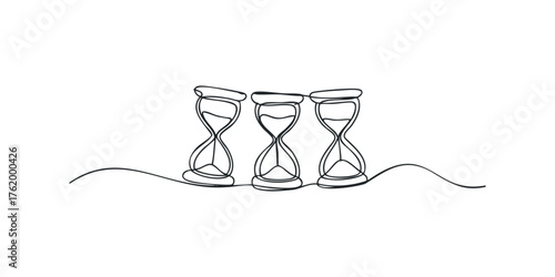 Three hourglasses with sand flowing down