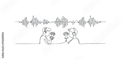Two people with headphones recording a podcast session