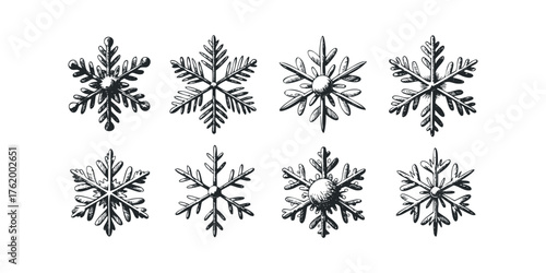 Set of eight unique snowflake drawings