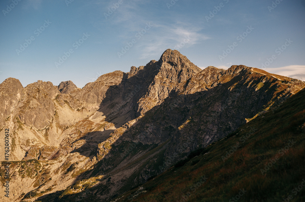 Fototapeta premium Rocky Mountain Range Under Clear Sky