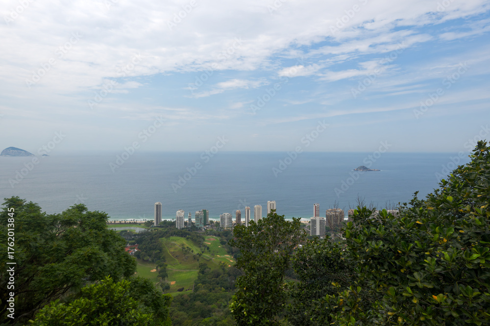 Obraz premium Aerial view of Brazilian city of Rio de Janeiro with scenic landscape and bay with skyline on a spring day. Photo taken October 13th, 2025, Rio de Janeiro, Brazil.