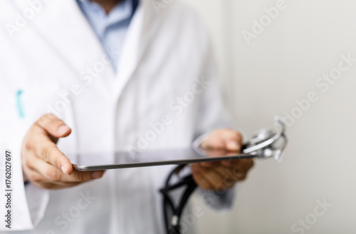 Close up of a doctor holdin...