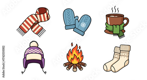 Cozy winter essentials: mittens, scarf, hot drink, hat, socks, and campfire