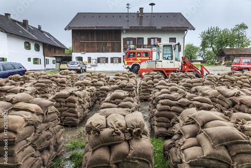 Sandbags, continuous rain, high water, flooding, fire brigade, town, houses, Whitsun floods 2013, climate change, Schlehdorf, Alpine foothills, Bavaria, Germany
