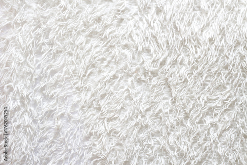 Fotografie Fluffy white blanket, soft bedspread background.