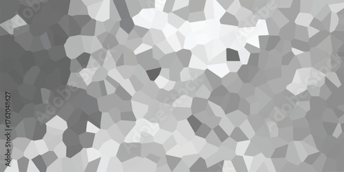 Abstract geometric mosaic background in shades of gray and white with irregular polygonal shapes creating a crystalline or stained-glass effect